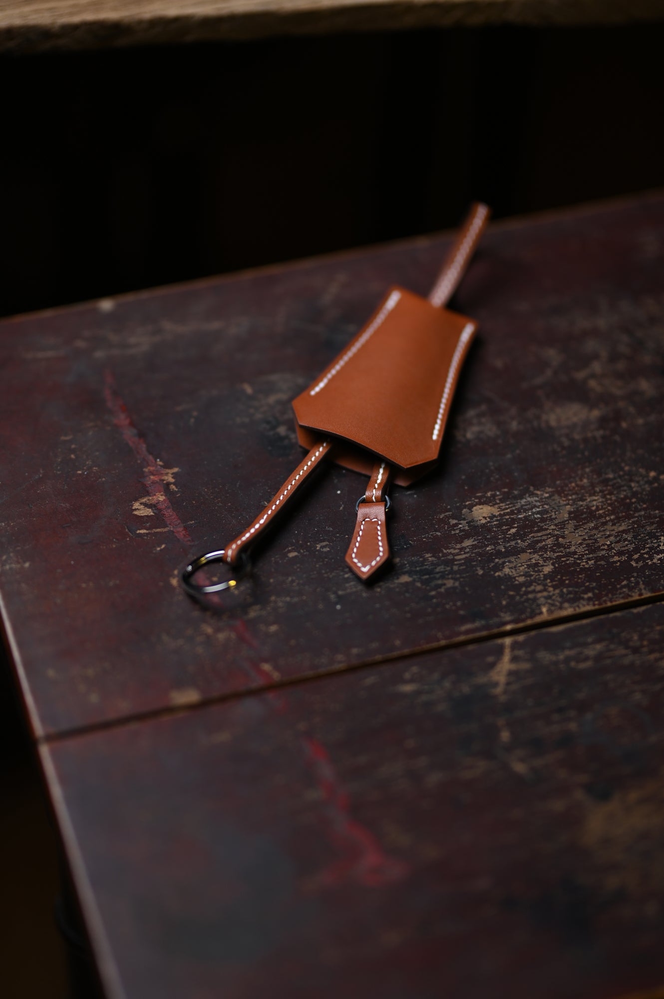 Key wrap with saddle