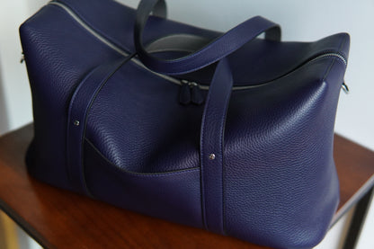 Litchi Embossed leather travel bag