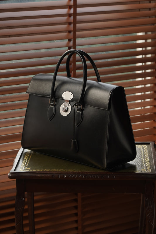 Box leather handbag