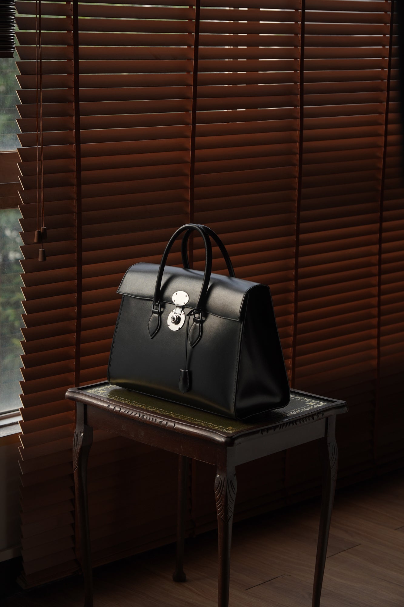 Box leather handbag