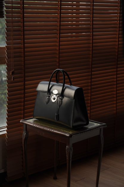 Box leather handbag