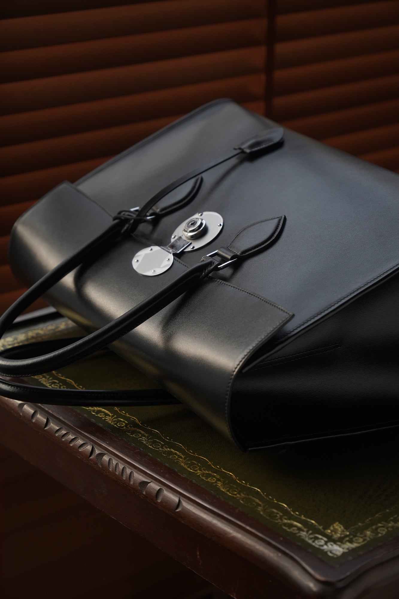 Box leather handbag