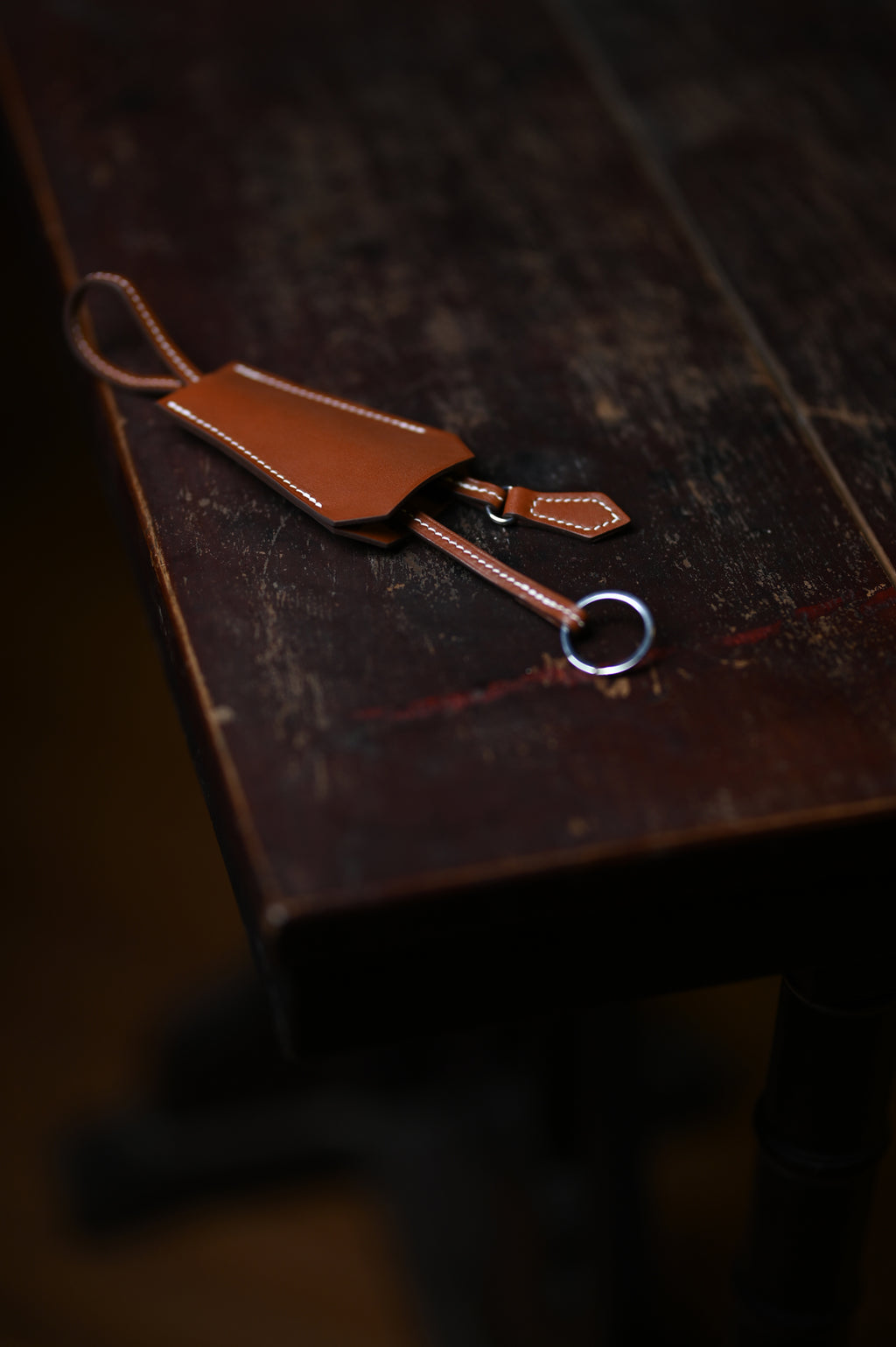 Key wrap with saddle