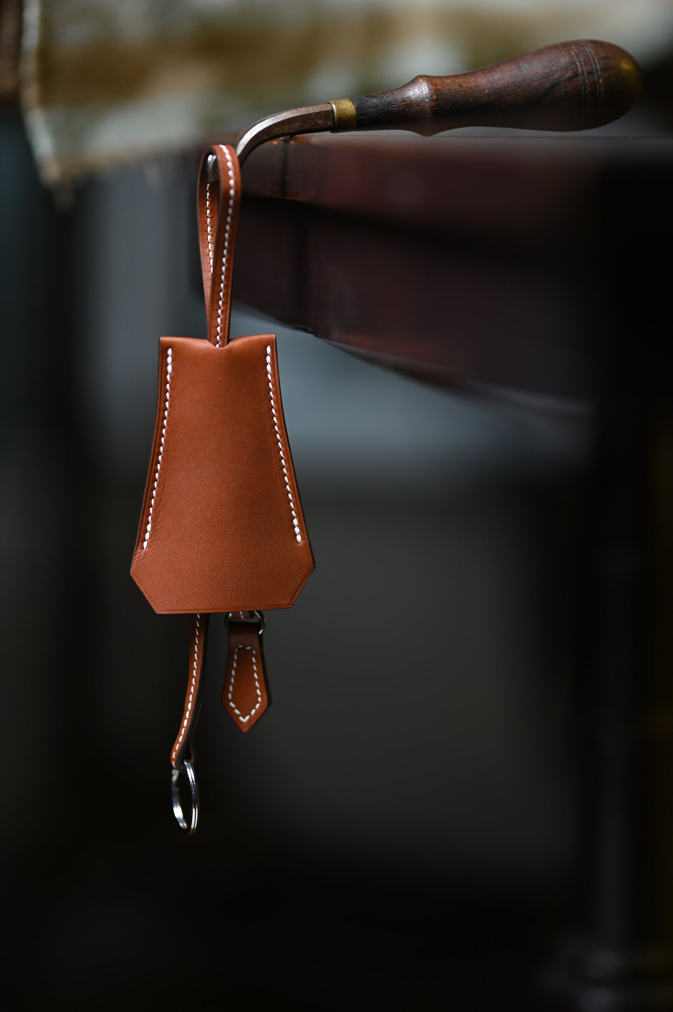 Key wrap with saddle