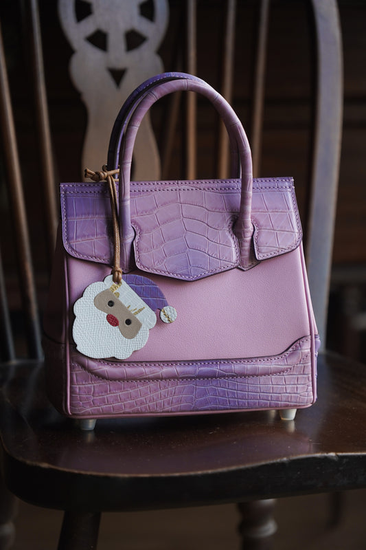 Handbag with crocodile in pink