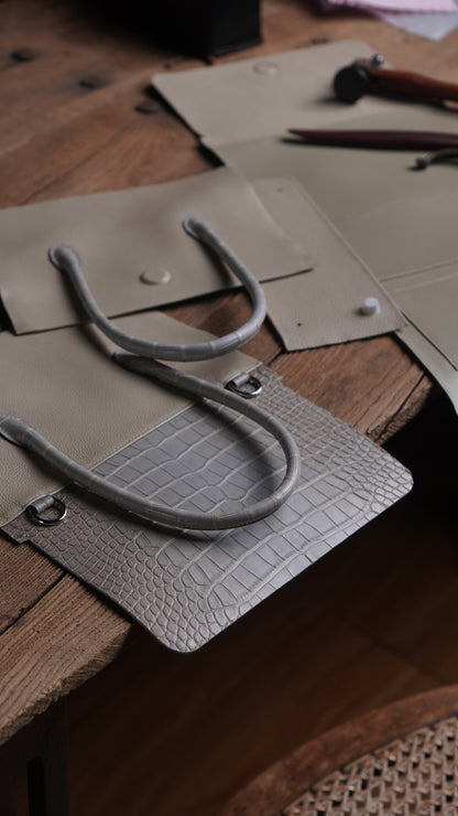 Handbag with silver gray crocodile
