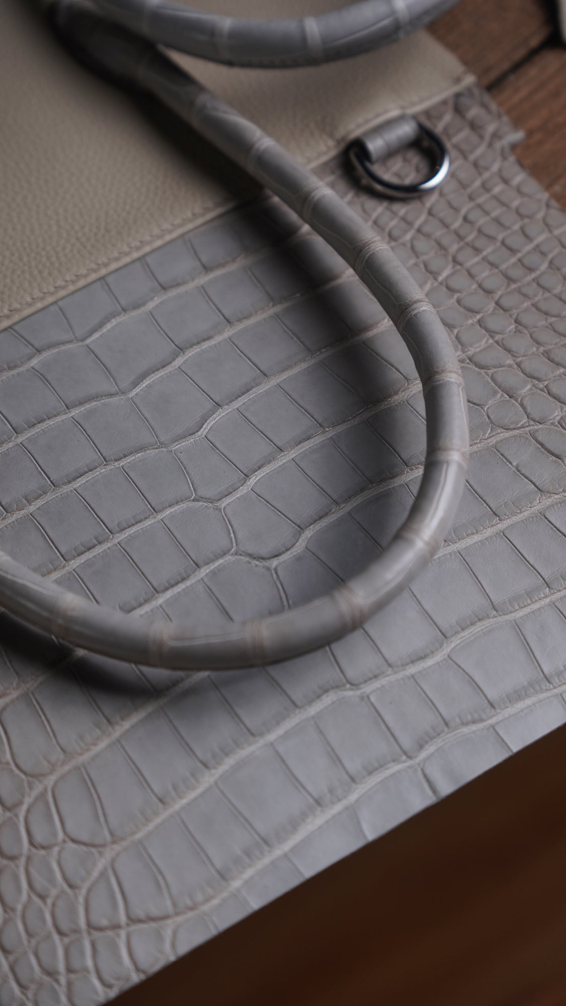 Handbag with silver gray crocodile