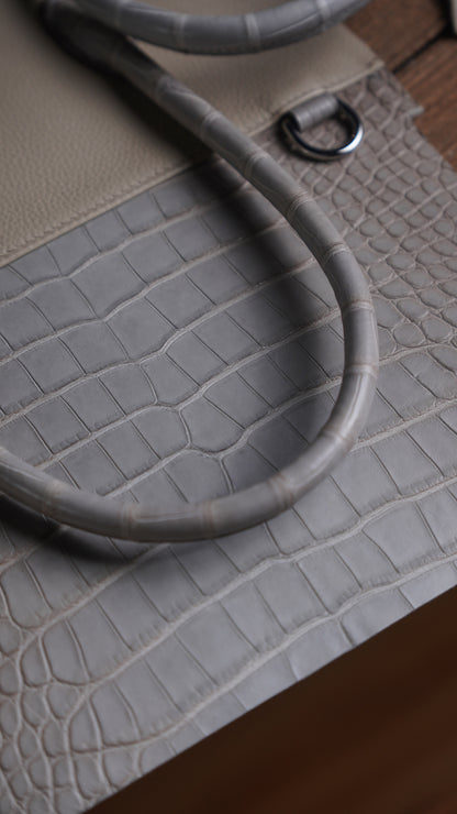 Handbag with silver gray crocodile
