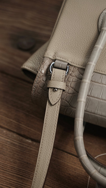 Handbag with silver gray crocodile
